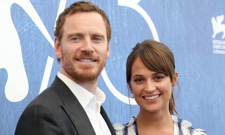 The Light Between Oceans is a romantic period drama film about an Australian couple during World War I. The couple is portrayed by German actor Michael Fassbender, age 40, and Swedish actress Alicia Vikander, age 29. The Love story from the set was translated into real life, and the beautiful couple got married in October 2017.
