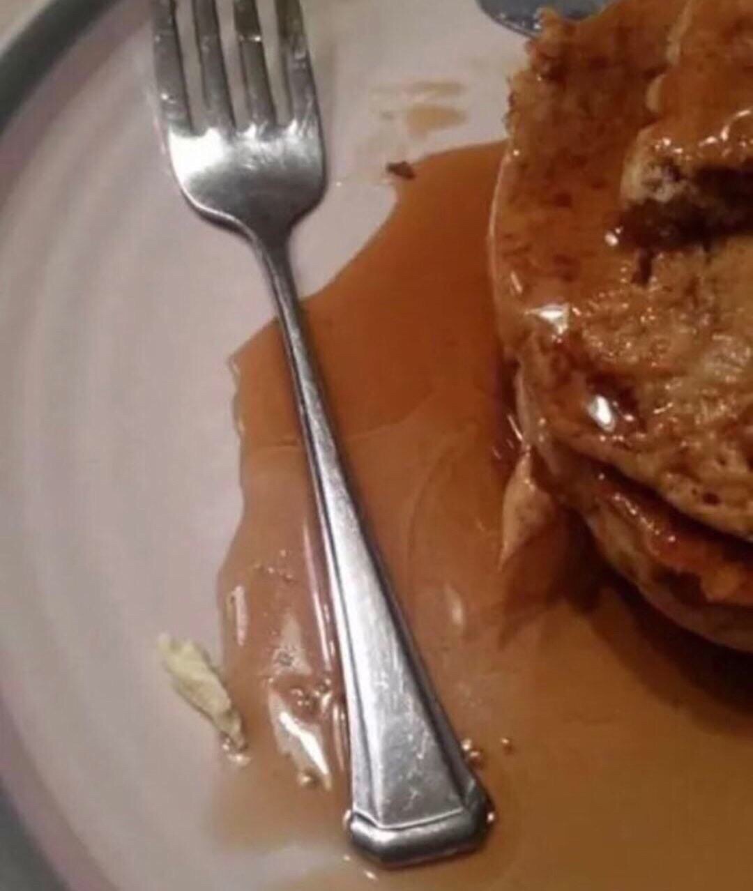 cursed image of fork that fell in the syrup of your dessert