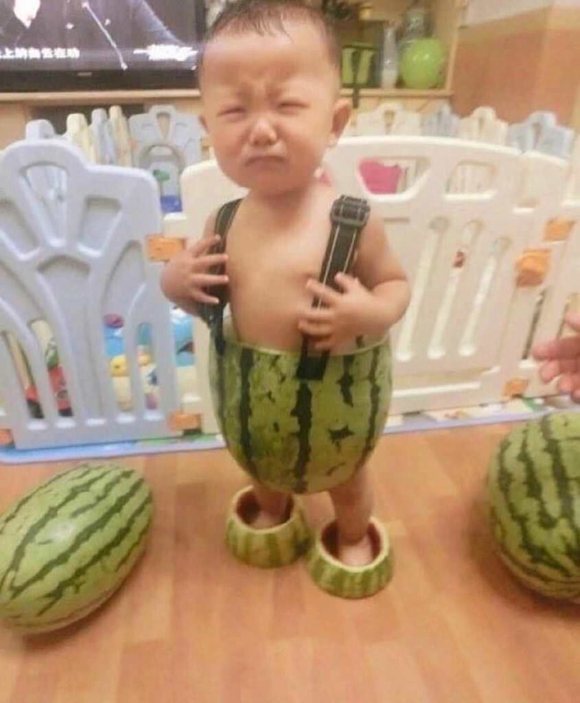 kid wearing watermelon outfit