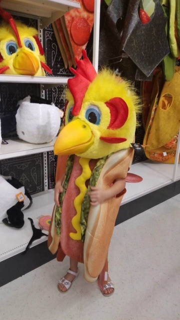 outrageous chicken costume worn by kid in a store
