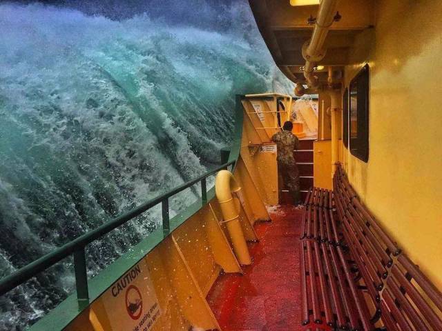 wave about to crash on a boat
