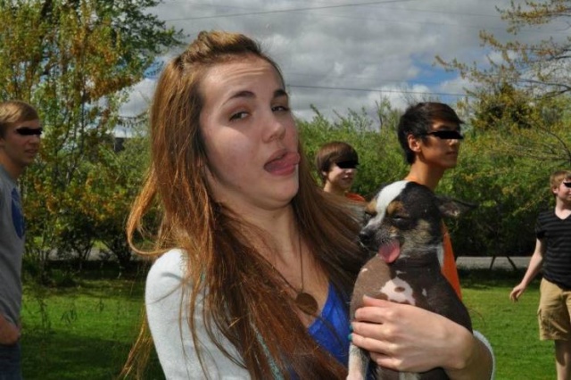 funny picture of a girl and a dog sticking their tongues out