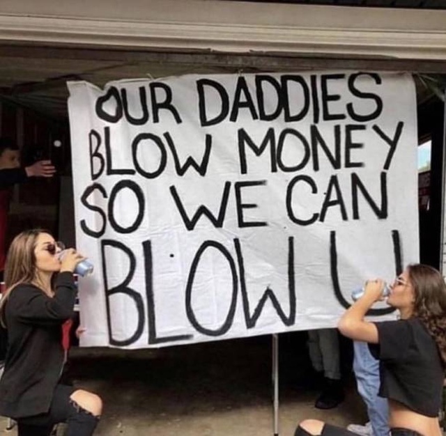 funny picture of two girls drinking from cans near a sign about blowjobs