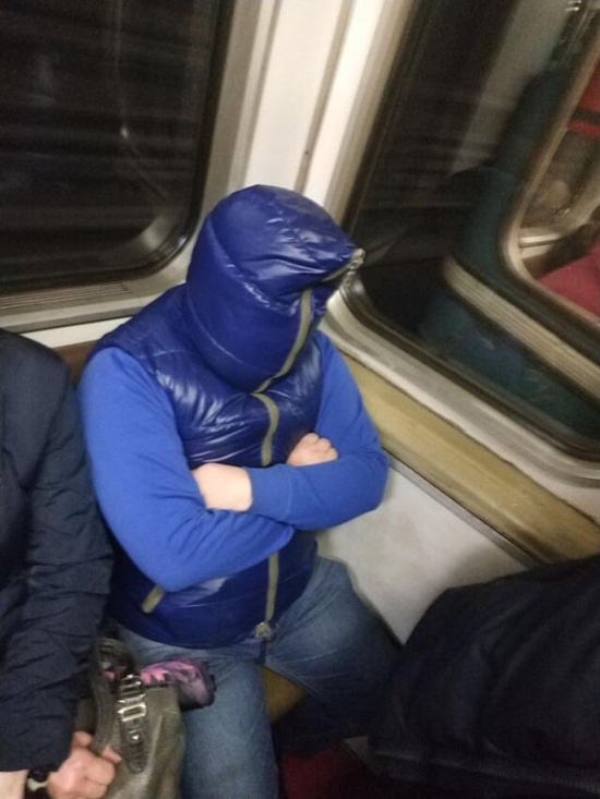 funny picture of a person with their hood zipped up over their face