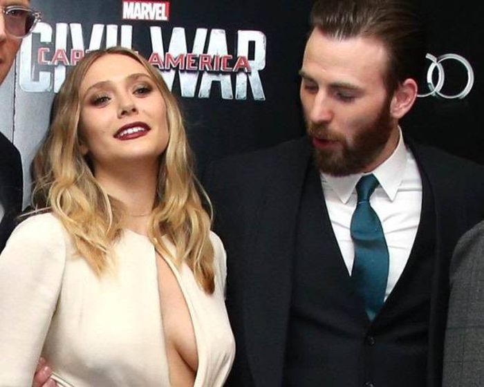 captain america staring at captain marvels breasts at photoshoot