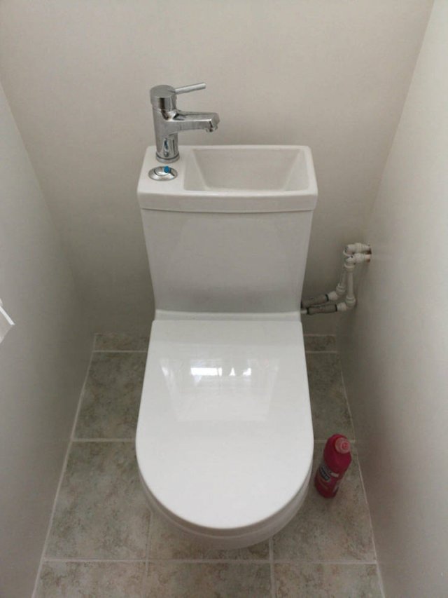 sink built into toilet waste