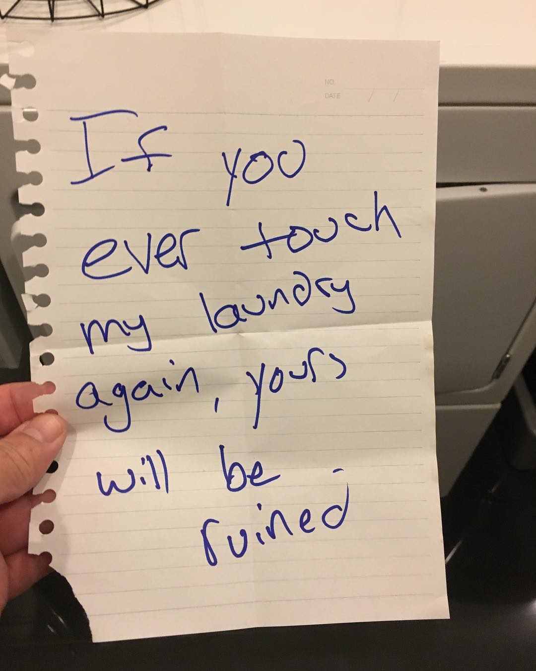 handwriting - If you ever touch my laundry again, yours will be . ruined