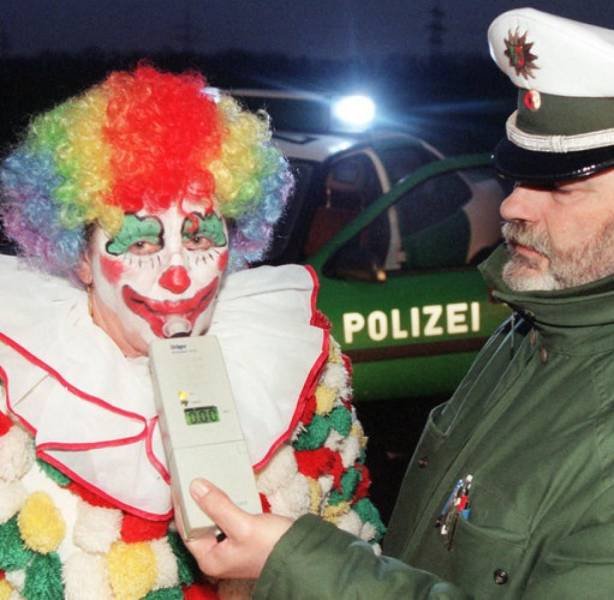 clown taking a breathalyzer test