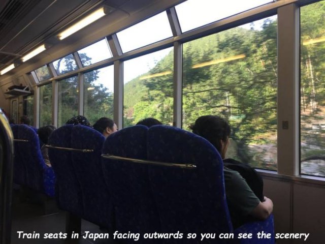 land vehicle - Train seats in Japan facing outwards so you can see the scenery