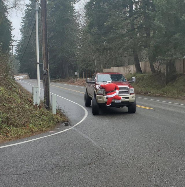 santa on the bumper of a car