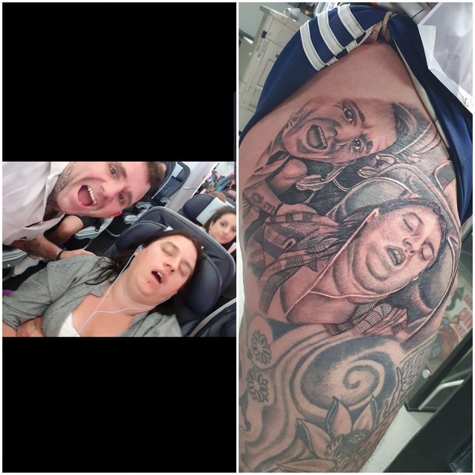 man tattoos his wife sleeping