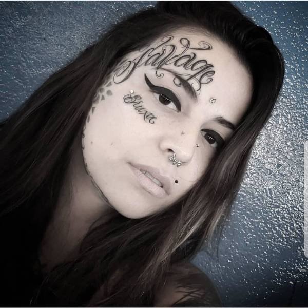 beauty savage gangster face tattoos