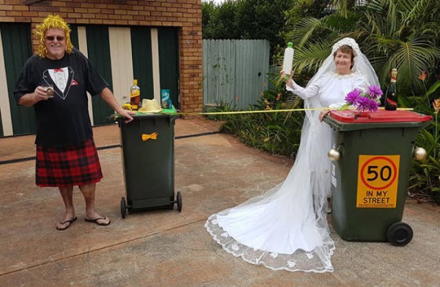 bride and groom getting married with their trashcans