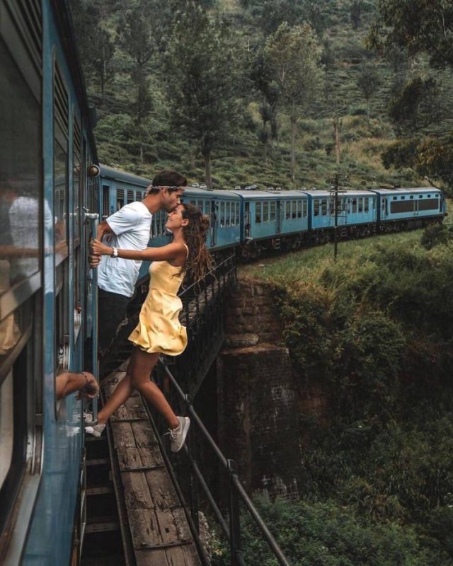 couple kissing train