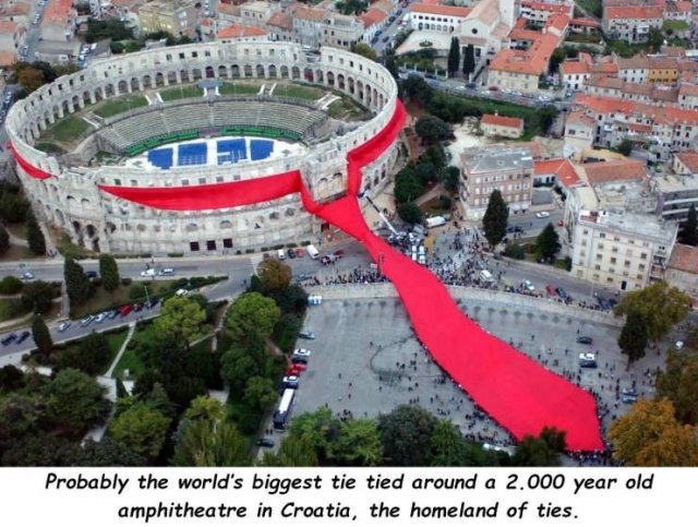 world largest tie - Probably the world's biggest tie tied around a 2.000 year old amphitheatre in Croatia, the homeland of ties.