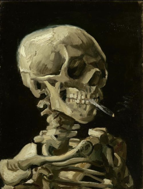 skull of a skeleton with burning cigarette