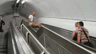 escalator fall gif