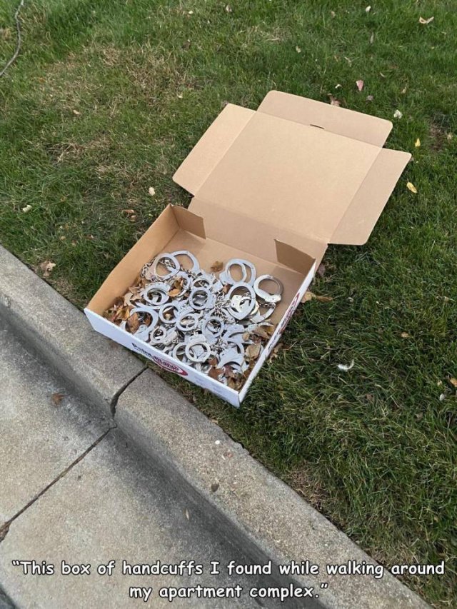 table - "This box of handcuffs I found while walking around my apartment complex."