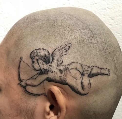 cupid head tattoo
