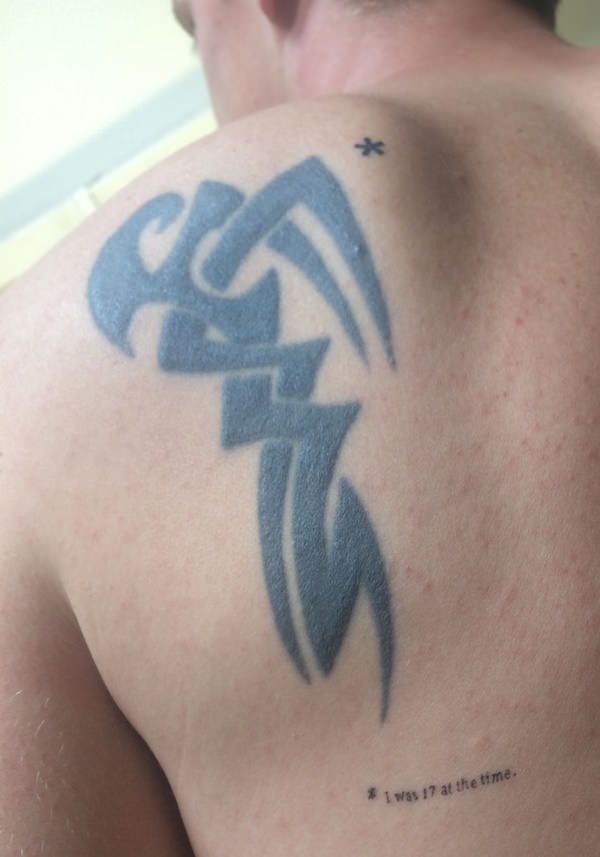 lame tribal tattoo - was 17 at the time.