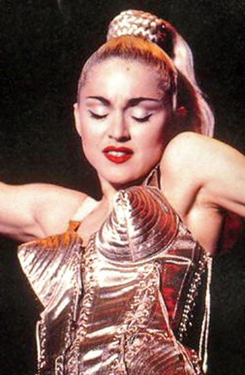 1990 - Madonna dons a conical bra for her Blond Ambition tour, accomplishing the impossible. She manages to make boobs undesireable and creepy.