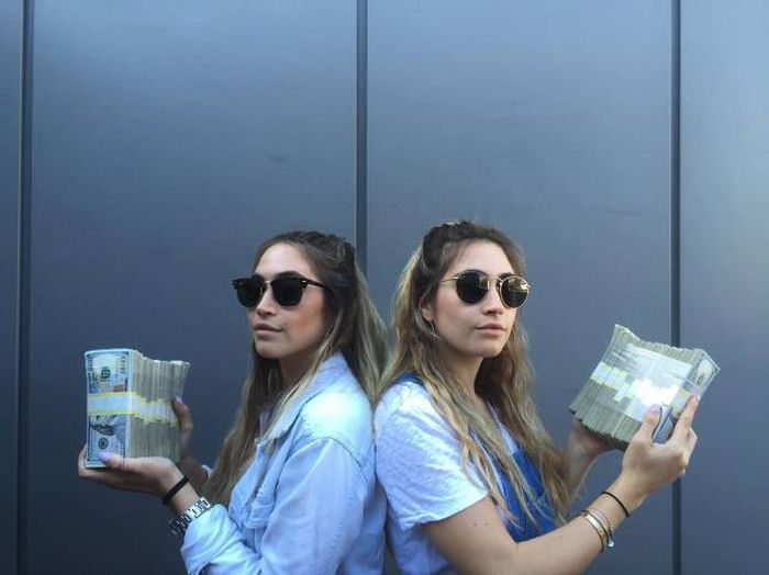 Meet the Kaplan twins. They're sisters who take photos of themselves with toys and then they sell them. It sounds simple enough, but they've made a fortune doing it.