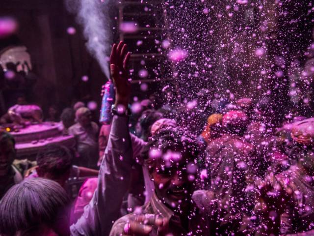 A celebration of spring, Holi is a festival that's celebrated throughout India with a massive fight where people throw vibrant-colored flours at each other. The awe-inspiring display has earned it the nickname "the festival of colors."