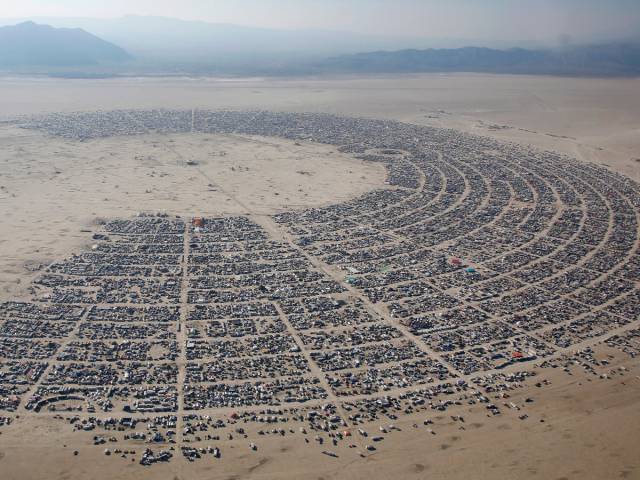 Every August, over 65,000 music and art lovers travel to Nevada's remote Black Rock Desert to enjoy music performances, wild costumes, and massive fire displays at the temporary community of Burning Man.