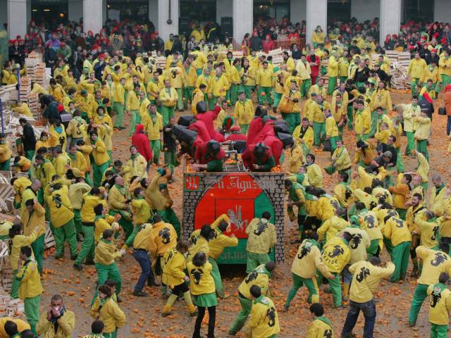 In February, thousands battle for victory at Ivrea's three-day Battle of the Oranges, the biggest food fight in Italy.