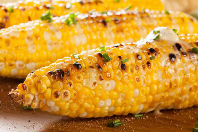 Try soaking your corn on the cob: Corn will grill with the husk both on and off, but if you peel the husk back to expose the kernels while grilling, soak them in water for 15 minutes. When the grill is hot, pull the husks back up around the cobs, twisting the leaves at the tip as needed to help them stay in place.
