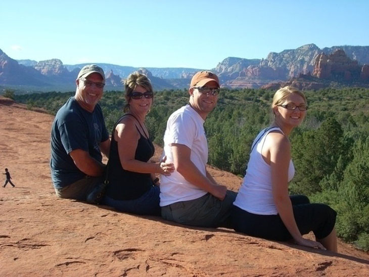 This isn’t a family of giants – they just took a photo on a mountain that blended perfectly with the rock below it. Try to spot the little guy.