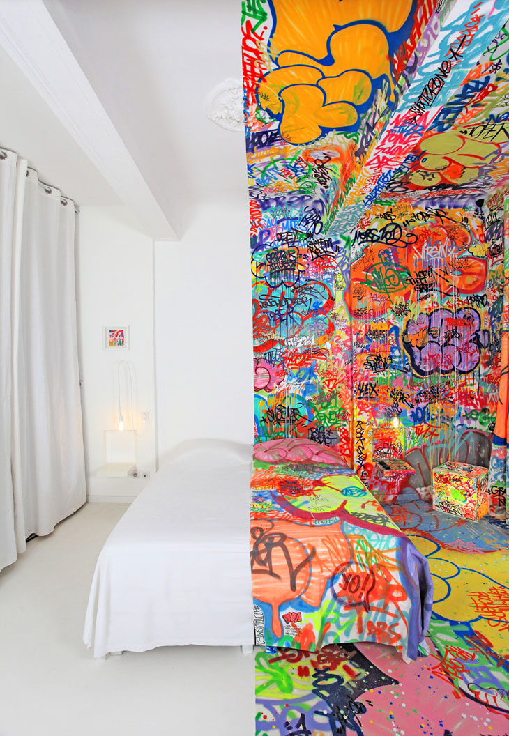 Marseille hotel room decoration where French graffiti artist Tilt has swamped one half, while the other half remains completely blank.