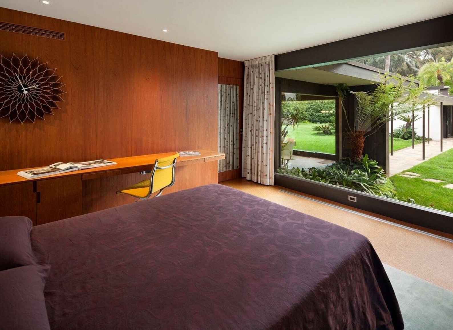 Floor-to-ceiling glass offering spectacular views of the garden were also put into the bedrooms.