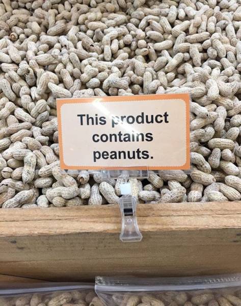 signs that humans are getting dumber - This product contains peanuts.