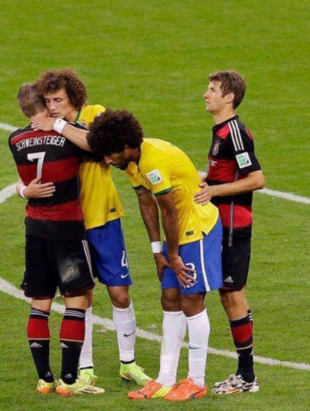funny picture of opposing teams consoling each other