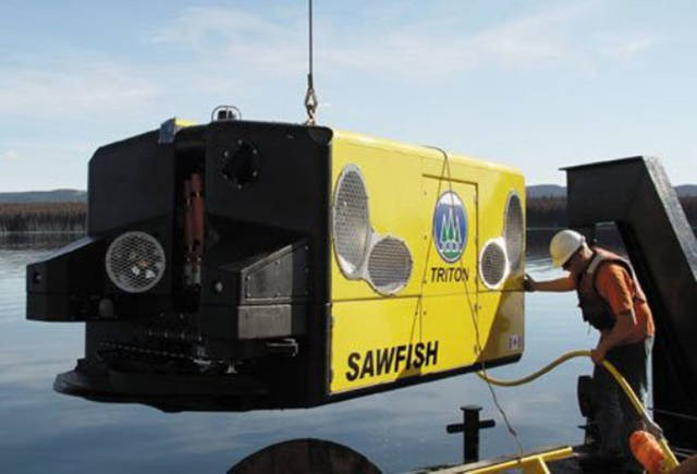 Underwater Lumberjacks: “Harvest old growth trees that have been covered over by diverted/dammed waterways.”