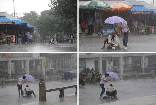 Woman covering a soaked man with her umbrella.