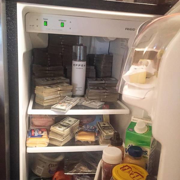 ... stowing racks of cash and his signature Effen Vodka in the refrigerator of said kitchen ...
