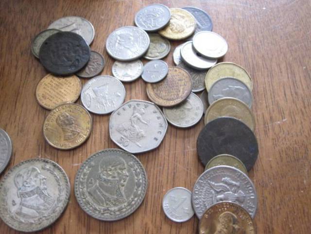 Here's a close-up of some of the coins, including a British 50 pence coin.