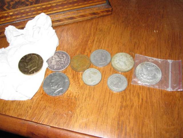 Some of the coins appeared to be very old, and on closer inspection...
