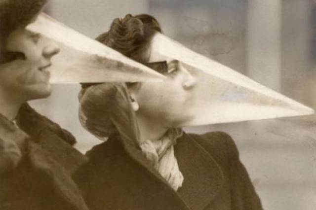 These were called Blizzard Cones. Before waterproof mascara was invented, women were offered these special masks as a way to protect their make-up from the elements.