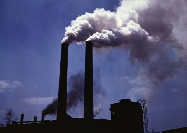 The emission of industrial pollutants would cease, leading to a cleaner environment, eventually stopping global warming.