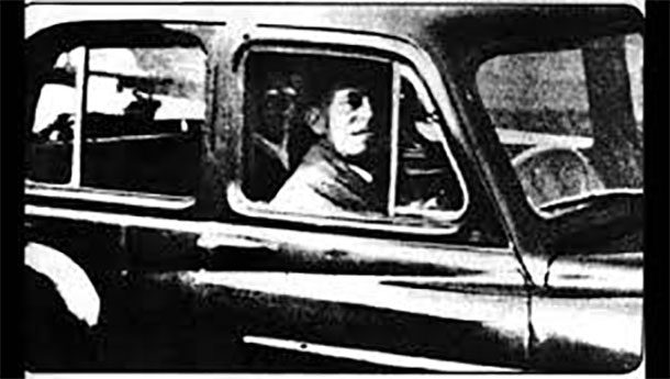 The Ghost in the Backseat: In 1959, when Mable Chinnery and her husband went to visit her mother’s grave, Mable turned around and snapped this picture of her husband waiting in the car. After developing the image, she was surprised to see a figure in the backseat wearing glasses. Until the day she died, she swore it was her mother.