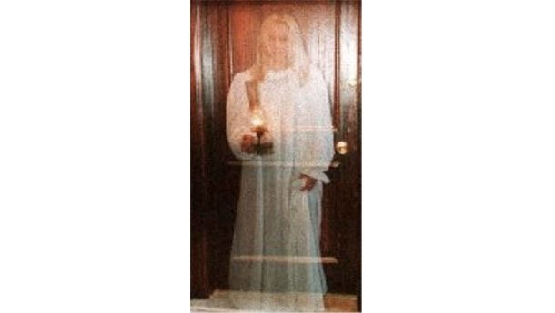 The White Lady of Haigh Hall: The ghost in the picture is rumored to be Lady Mabel Bradshaigh, the wife of a knight who died sometime in the 14th century.