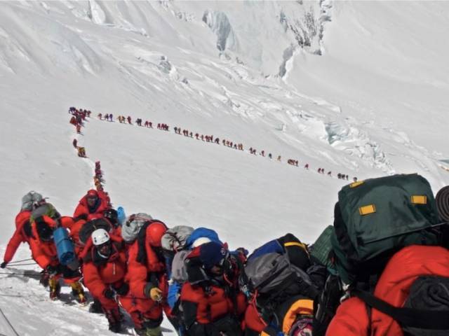 There was a time when conquering Mount Everest was considered a great feat. These days you have to stand in line.