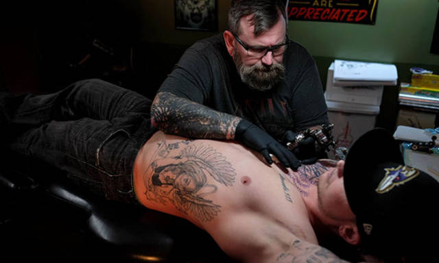 Dave Cutlip, the owner of Southside Tattoo in Baltimore, Maryland helps people cover up their racist and gang-related tattoos completely for free.