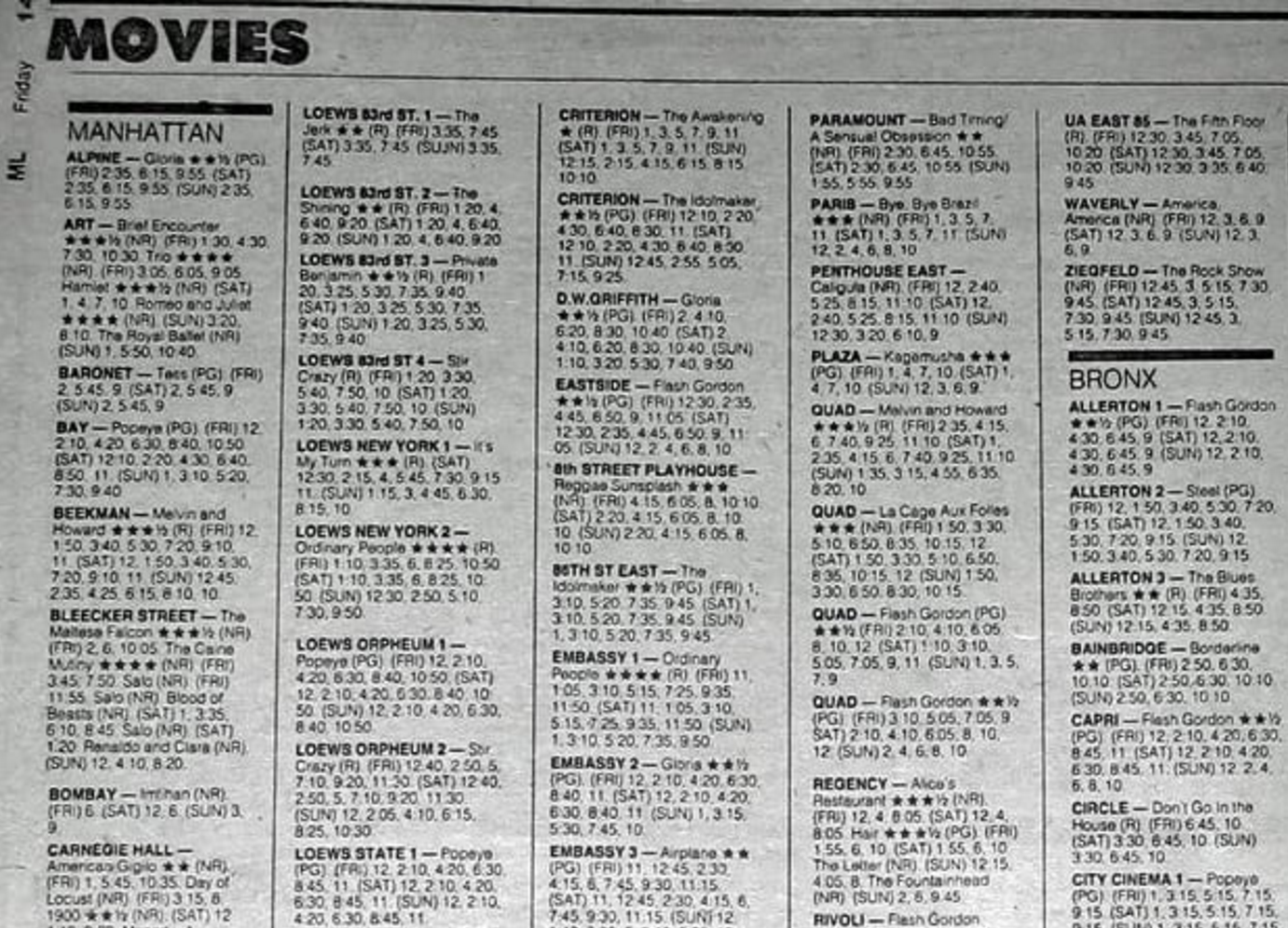 Looking up movie times in a real, physical newspaper.