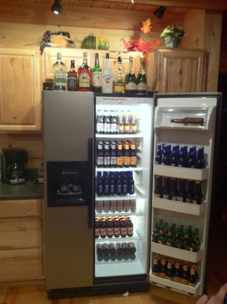 random pic refrigerator full of drinks