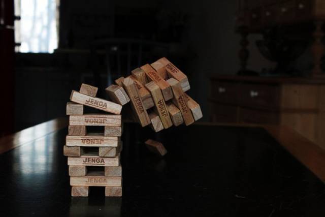 1987: Jenga - Jenga is a uniquely stressful game that consists of building a tower of wooden blocks, removing them one at a time, and replacing them on the top of the tower. Each move makes the tower taller and unstable. You don't want to be the one to knock it down. Jenga was trademarked in 1983, but the game didn't gain popularity until a few years later.