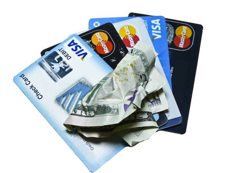 The average American family carries a credit card debt of $8,000.